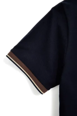 Polo blu con colletto a contrasto e logo ricamato Us golf PO2607